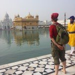 Mikey stands facing the Golden Temple in Amritsar